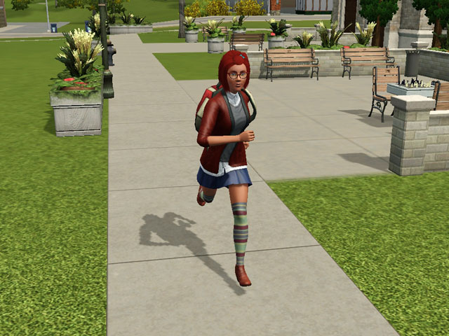 Sims 3: Студенты ходят по территории университета с рюкзаками за спиной.