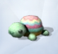 Черепаха мятного цвета с панцирем в пастельных тонах 