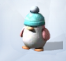 Розовый пингвин с синей шапкой