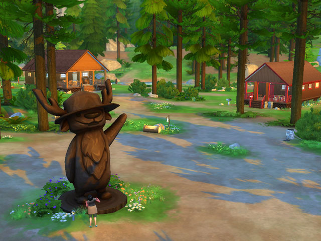 Sims 4: Персонажи могут взаимодействовать с гигантской статуей лесничего в центре лагеря.