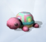 Розовая черепаха с панцирем в пастельных тонах