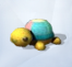 Желтая черепаха с разноцветным панцирем
