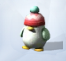 Зеленый пингвин с красной шапкой